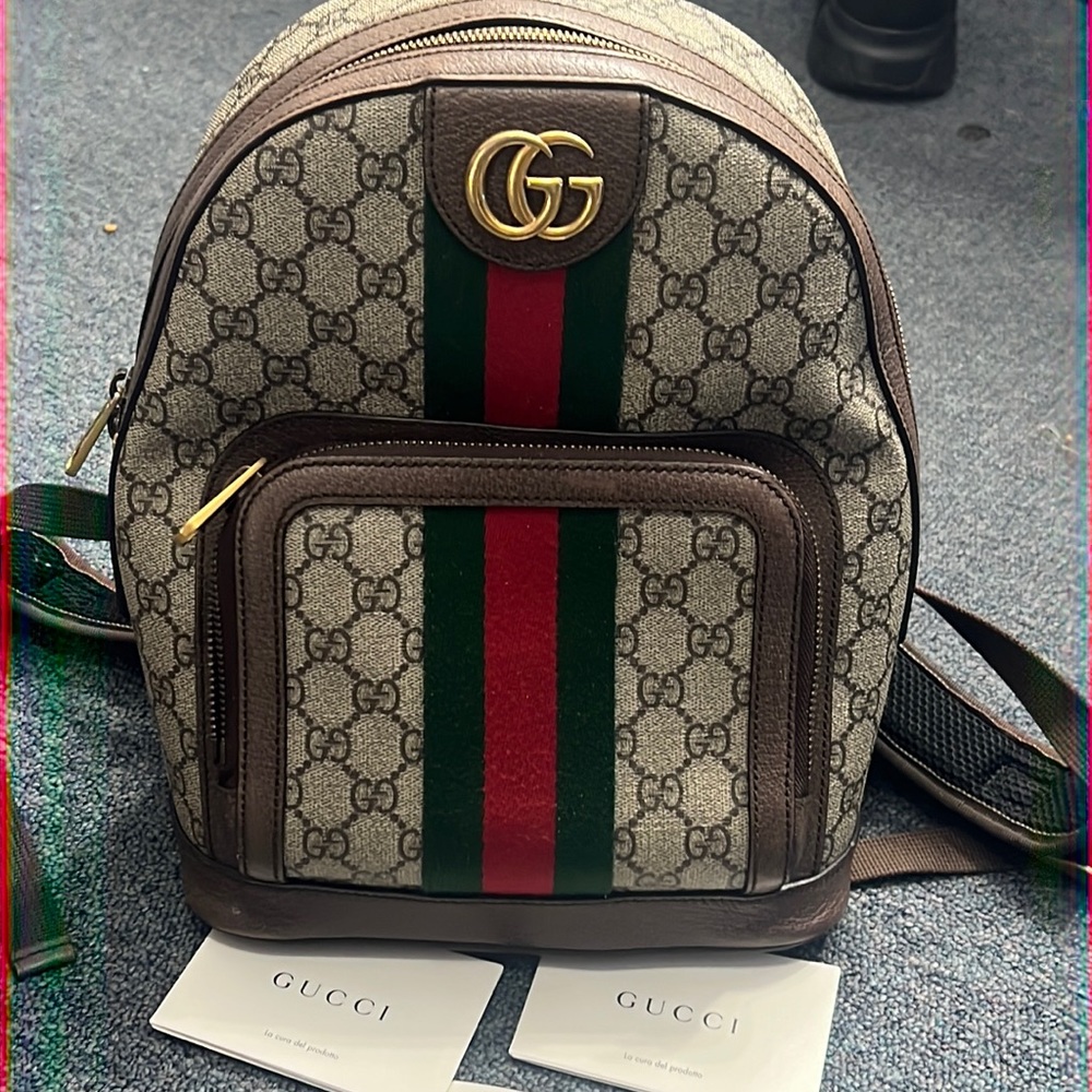Gucci backpack. Used but very well taken care of. 

Dust bag, box and receipt.